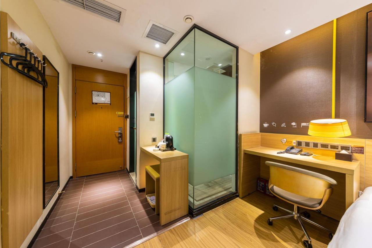 Iu Hotel Chongqing Jiefangbei Exterior foto